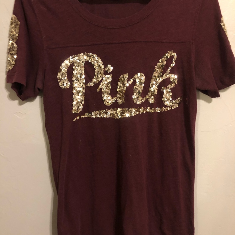 A marroon PINK sparkly shirt